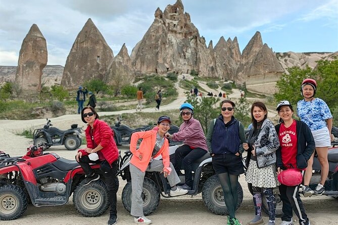 Capadocia atv tour through fairy chimneys and love valley - Entering the Göreme Valley: cave houses, narrow roads, and a viewpoint climb