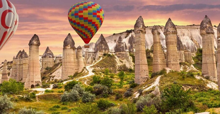 Cappadocia: Göreme Sunrise Hot Air Balloon Ride w/ Breakfast - Early pickup and the pre-flight scene around Göreme