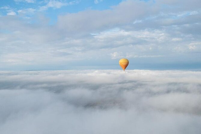 Cappadocia Hot Air Balloon Ride Over Cat Valley Fairy Chimneys - From your hotel to balloon inflation: how the morning runs