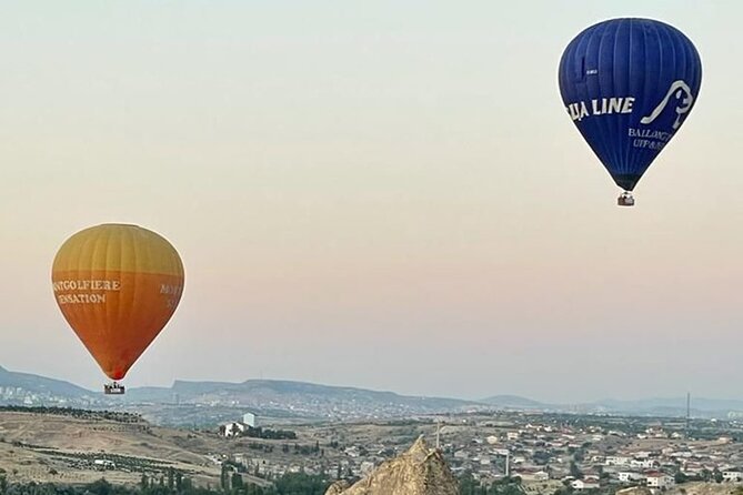 Cat Valley Ballon Tour In Cappadocia With Free Hotel Transfer - Stop 2 in the sky: sunrise colors, cave homes, and pigeon nests