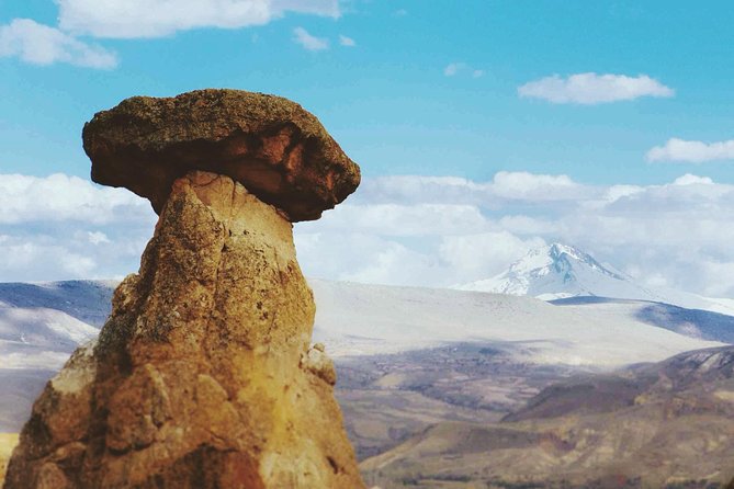 Full Day Private Cappadocia Tour (Luxury Van + Private Guide ) - Pigeon Valley: calm scenery with a useful backstory