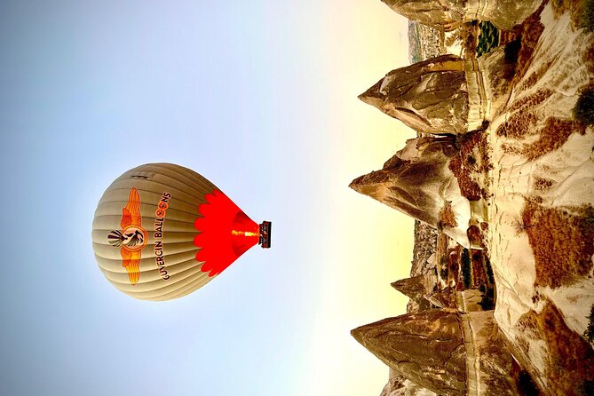 Goreme/Cappadocia Sunrise Hot Air Balloon Flight with Pickup - Launch site routine: breakfast, balloon inflation, and the safety briefing