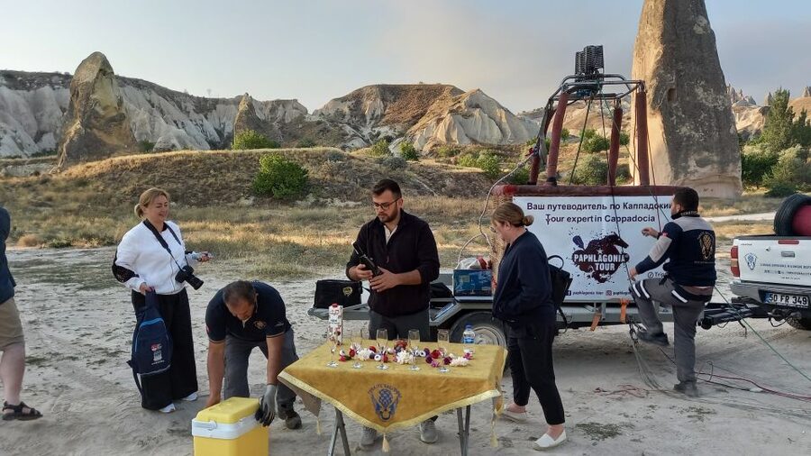 Göreme: Luxury Hot Air Balloon Flight in Göreme Valleys - Landing safe, then rolling into certificates and your flight video