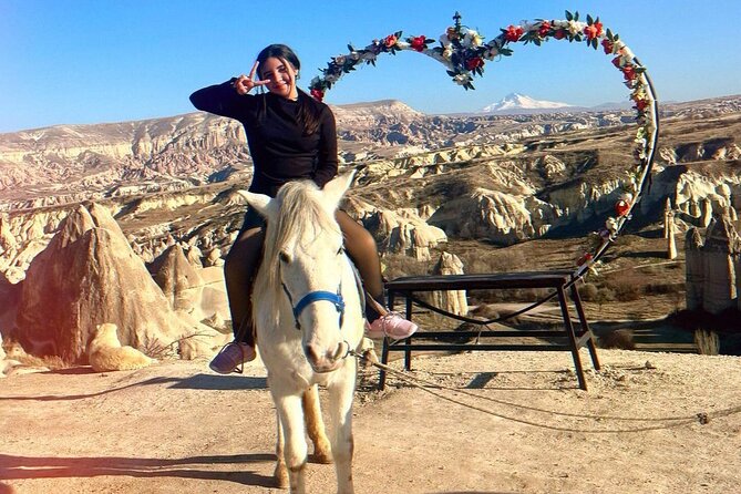 Guided Horse Riding through the Valleys in Cappadocia - Hot air balloons overhead: timing, motion, and the photo reality