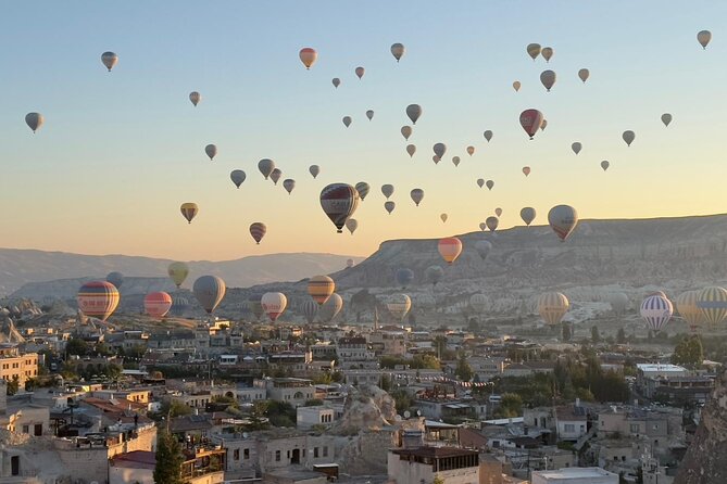 Sunrise Hot-air Balloon in Magical Cappadocia with Breakfast and Champagne - Cappadocia Cave Dwellings Stop: Seeing the Rocks Up Close